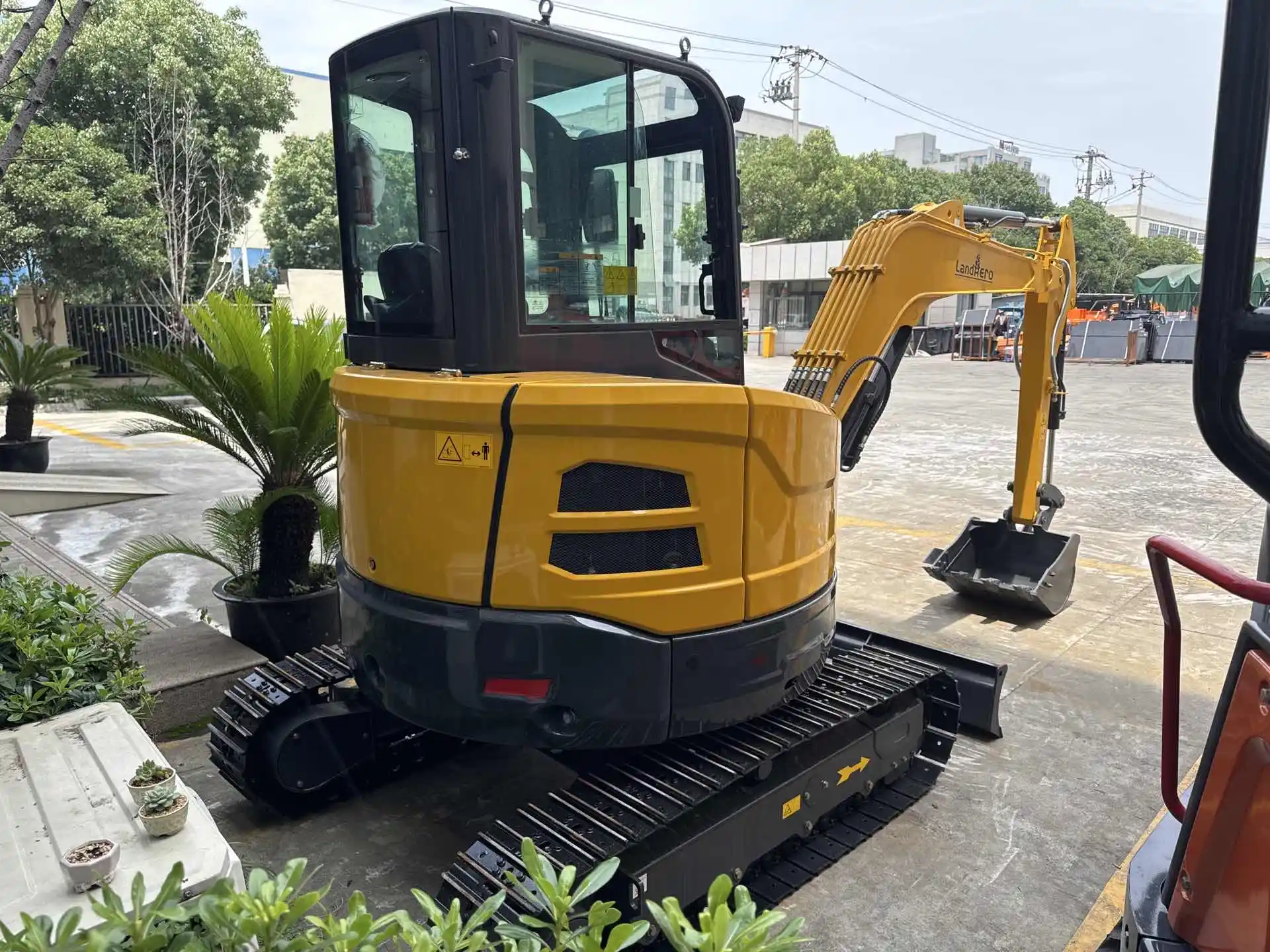 a yellow and black landhero construction vehicle